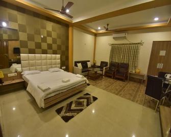 OYO 28412 Green Touch Eco Resort - Lataguri - Habitación