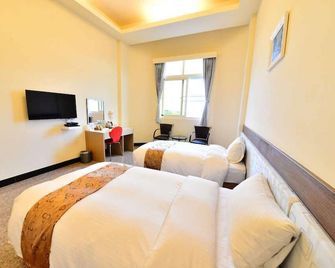 Hu Ye Resort - טאינאן - חדר שינה