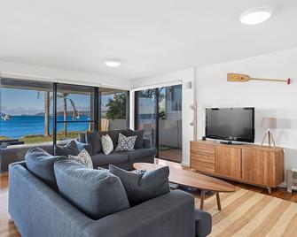 Absolute waterfront at tranquil Soldiers Point - Taylors Beach - Living room
