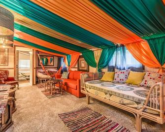 Wonders of the World - Lenexa - Living room