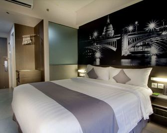 نيو تيندين جاكارتا باي أستون - جاكرتا - غرفة نوم