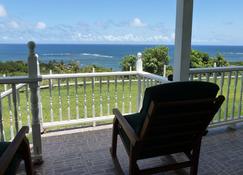 Home-styled cottage on Nevis with spectacular views of the Caribbean Sea - Newcastle - Balcony