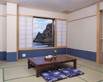 Marubun The Seaside Inn - Shin'onsen - Schlafzimmer
