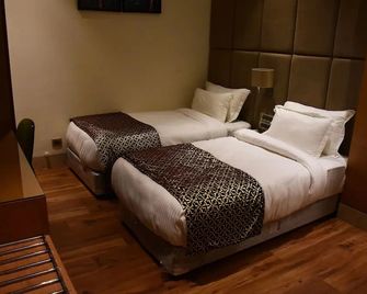 Hare krishna Orchid Vrindavan - Vrindavan - Schlafzimmer