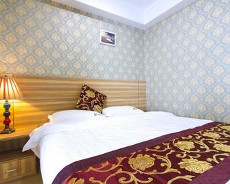Center Of City Creo Hotel - Yanbian - Bedroom