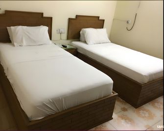 Grace Hotel And Restaurant - Faisalābād - Bedroom
