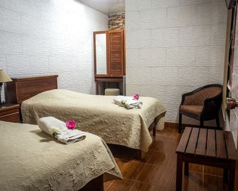 Boutique Hotel Casa Orquídeas - San José - Habitación