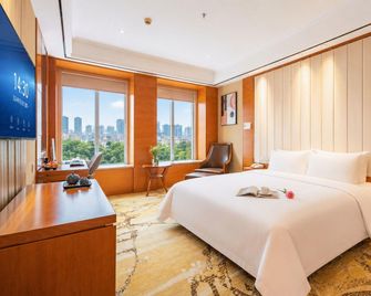 Canfitez Hotel - Mianyang - Bedroom