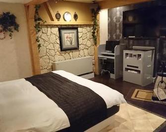 Hotel Birthday Kakamigahara - Kakamigahara - Ložnice