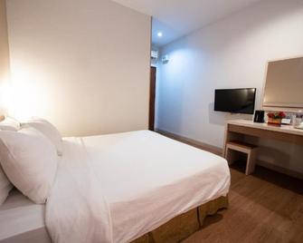 Lovina Inn Penuin Hotel - Batam - Camera da letto