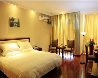 Greentree Inn Jiangsu Wuxi Central Bus Station Guangrui Road Express Hotel - Wuxi - Camera da letto
