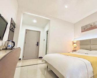 Qiongxi Seaview Hotel (Hai Dongfang Beach Park Branch) - Dongfang - Bedroom