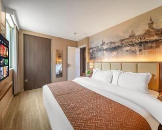 Dongsheng Hotel - Цзеян - Спальня
