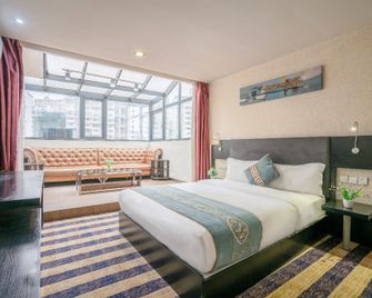 Kaili Shangjie Hotel (International Trade Shopping Center) - Qiandongnan - Bedroom