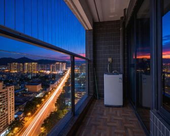 Tianqin Mushang Hotel Apartment (Huizhou Central Hospital West Lake Branch) - Huizhou - Balcony