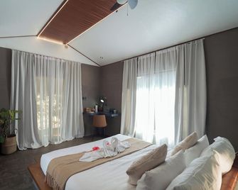 Inigtan Lio Villas - El Nido - Schlafzimmer