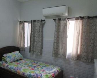 Beach House - very good - air conditioned - Caraguatatuba - Habitación
