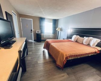 Residential Suites Blue Springs by Hotel O I 70 - Grain Valley - Bedroom