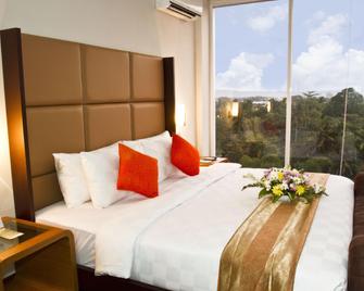 @Hom Premiere Cilacap Hotel - Cilacap - Camera da letto