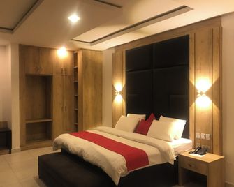 Bonphine Luxury Suites - Абуджа - Спальня