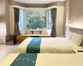 Ming Shan Resort - נאנטו סיטי - חדר שינה