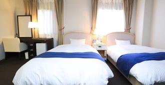 Ariston Hotel Miyazaki - מיאזאקי - חדר שינה