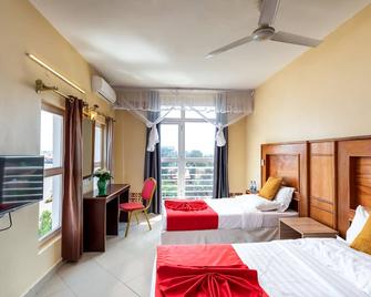 Pulickal Airport Hotel - Entebbe - Bedroom