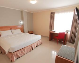 Maleosan Inn Manado Hotel - Manado - Bedroom