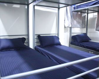 Fostel- The Fort Hostel - מומבאי - חדר שינה