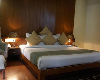 Hotel The Amaris - רישיקש - חדר שינה
