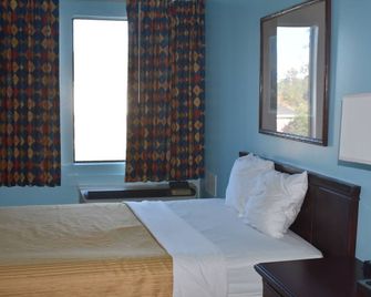 Guest Cottages & Suites, Brunswick Ga - ברנסוויק - חדר שינה