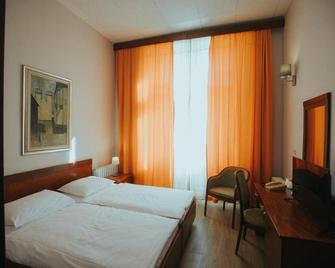 Hotel Central - Osijek - Slaapkamer