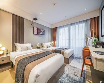 Heyue International Apartment (Shenzhen Yantian Shatoujiao Zhongying Street Branch) - Shenzhen - Bedroom