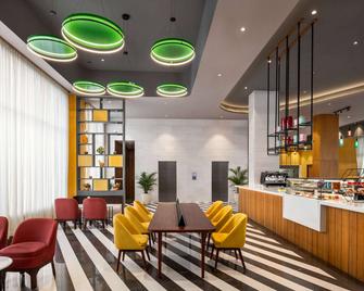 Ramada Encore by Wyndham Amritsar Airport - Amritsar - Restaurante
