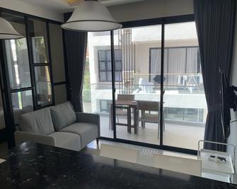 Apartment at Palmyrah Surin by Lofty - Choeng Thale - Living room