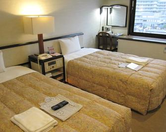 Ako Royal Hotel - Ako - Ložnice