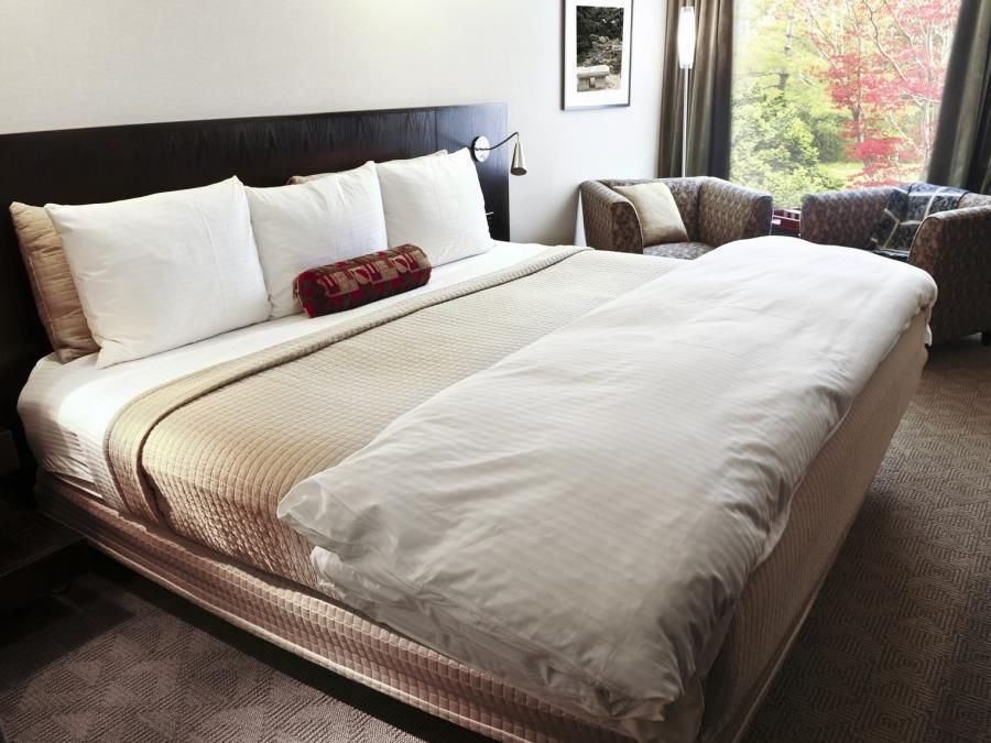 Srinidhi Grand Inn - באנגאלור - חדר שינה