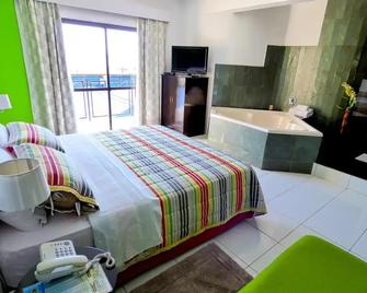 De La Costa Hotel - Encarnacion - Camera da letto