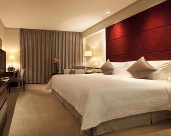 Howard Johnson Parkland Hotel Dalian - Dalian - Yatak Odası