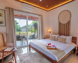 amã Stays & Trails The Lamp House, Goa - Utorda - Schlafzimmer