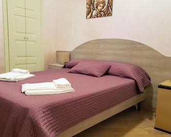 Rooms Gli Arcangeli - Affitti Brevi Italia - Monte Sant'Angelo - Bedroom