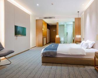 Jia Yue Hotel - Qionghai - Bedroom