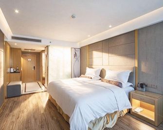 Huacai Hotel - Shangrao - Bedroom