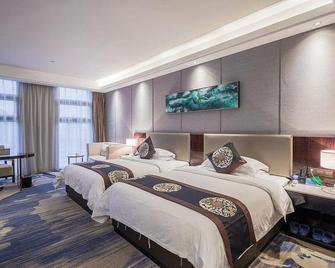 Zhuzhou Hujing Hotel - Zhuzhou - Schlafzimmer