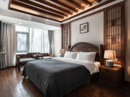 Lijiang Sinkoo Hotel - Lijiang - Schlafzimmer