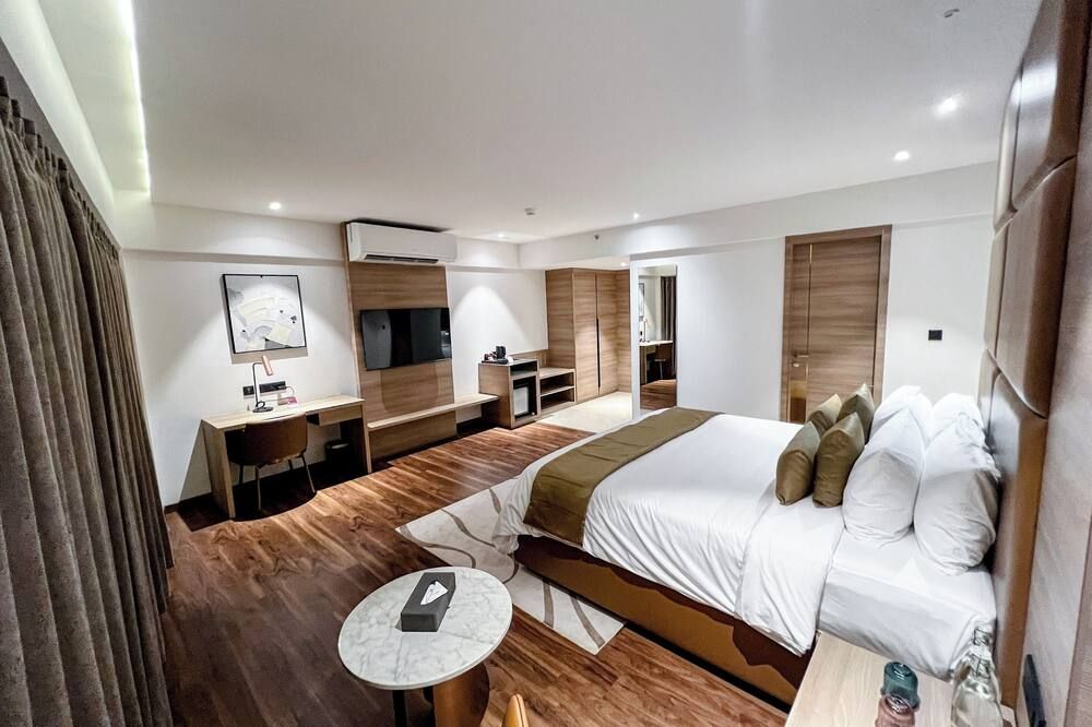 Oshin Calicut - Kozhikode - Schlafzimmer