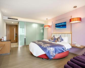 Zhaoqing Shanshui Fashion Hotel Xijiang Road Branch - Zhaoqing - Bedroom