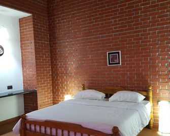 Plumeria Eco Trails Resort - Kodaikanal - Bedroom