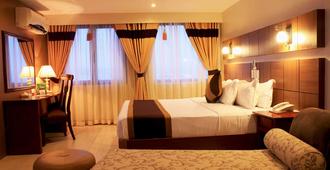 The Pinnacle Hotel and Suites - Davao City - Bedroom