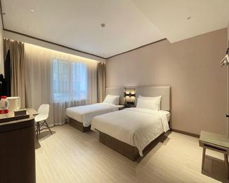 Hanting Express Tianjin Heping Road - Thiên Tân - Phòng ngủ